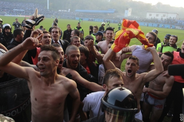 Velkoski celebrates with the Macedonian flag