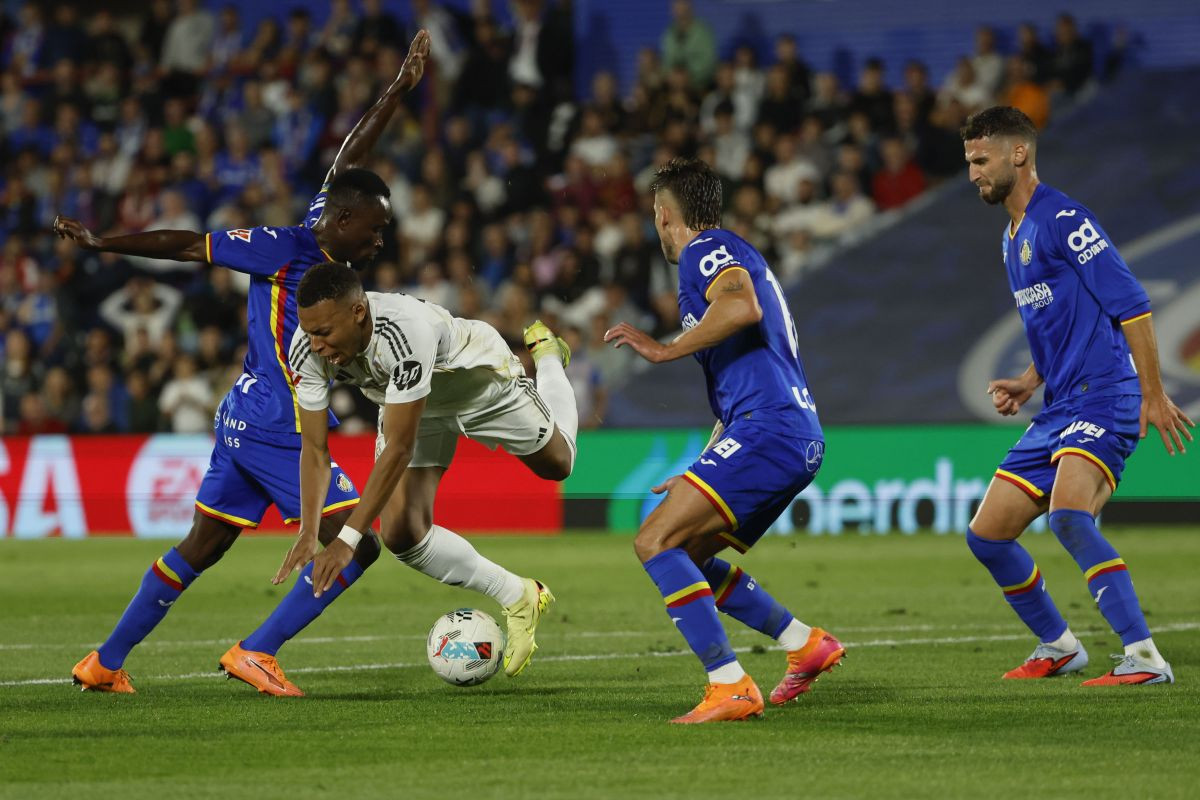 Real se patio sa hrabrim Getafeom, ali na kraju su iskoristili dva igrača više na terenu Real se patio sa hrabrim Getafeom, ali na kraju su iskoristili dva igrača više na terenu