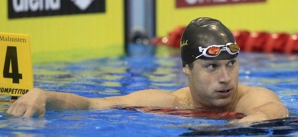 Plivač Markus Rogan nosi austrijsku zastavu na Oi